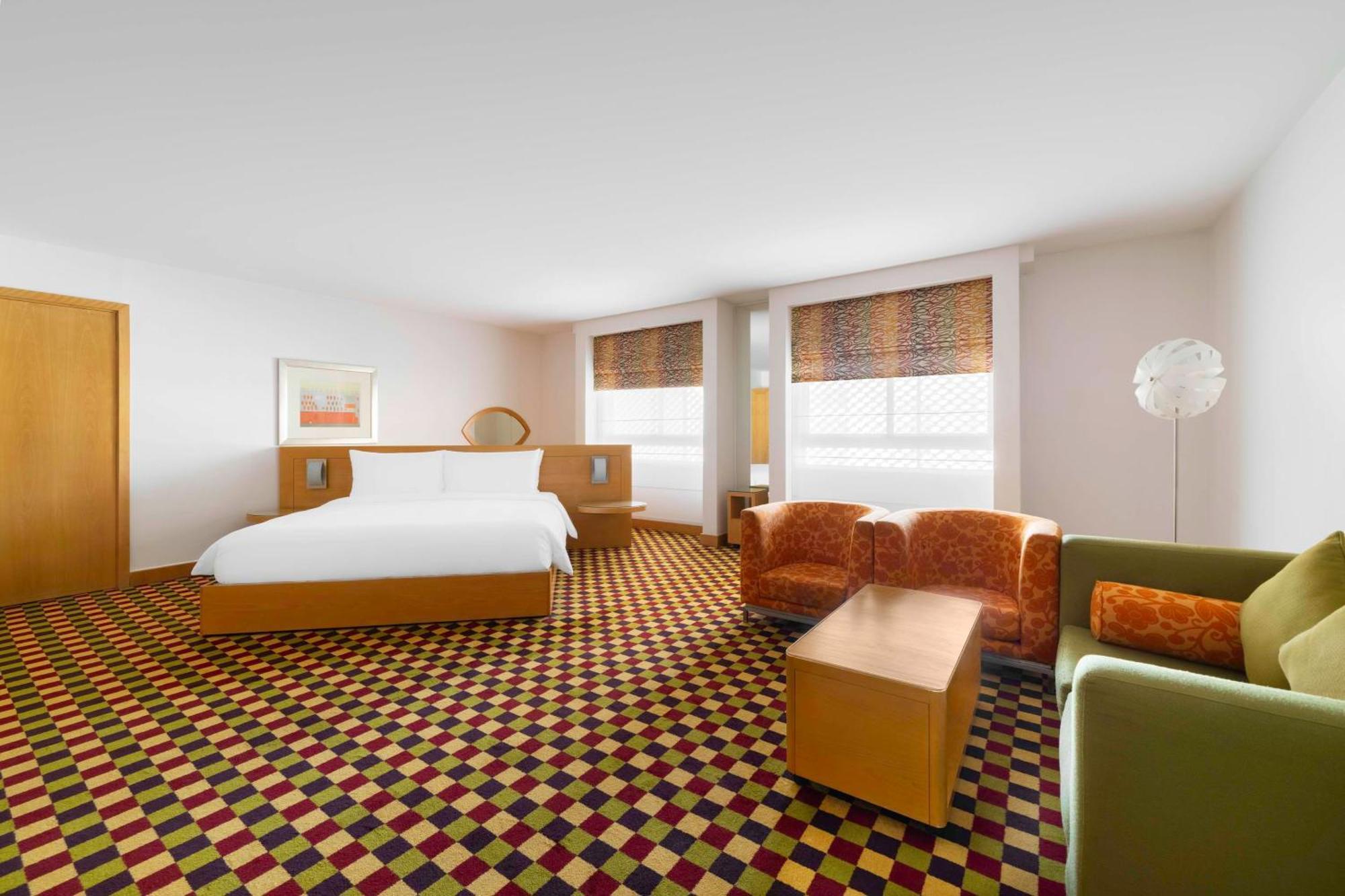 Radisson Blu Hotel, Rijád Exteriér fotografie A room at the Standard East Village
